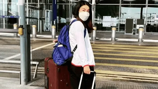 郭晶晶前往日本任奥运跳水评委 霍启刚为爱妻送行