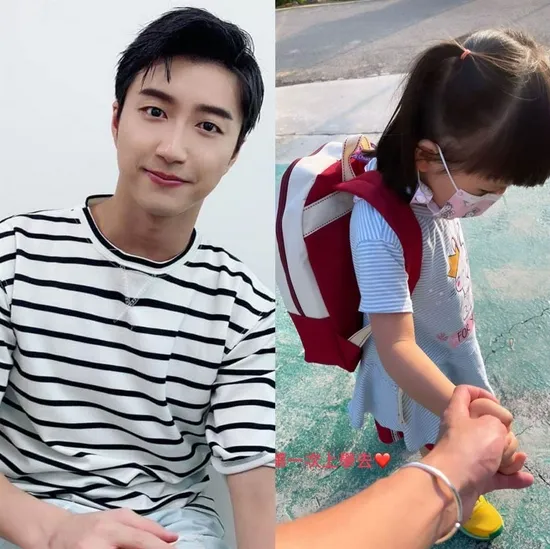 江宏杰紧牵3岁女亲送上学