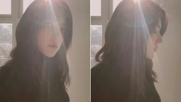 许玮甯婚后晒老公视角美照 长卷发更显精致侧颜