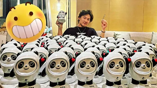 Su Yiming mistakenly posted a large amount of magazine materials and took a group photo with Bing Dwen Dwen, with an expression of playing with the stem