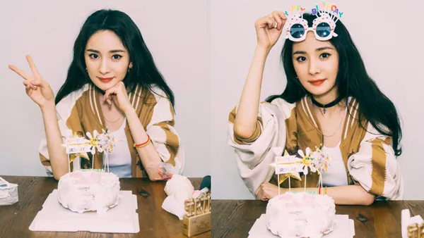 杨幂亲手为粉丝制作蛋糕 单手比耶面露微笑明媚动人