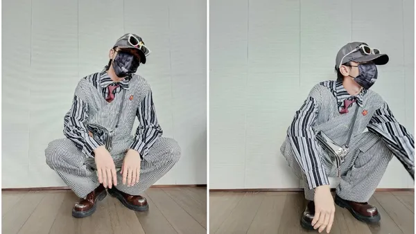 蔡徐坤分享最新随拍 穿条纹套装摆造型酷帅十足