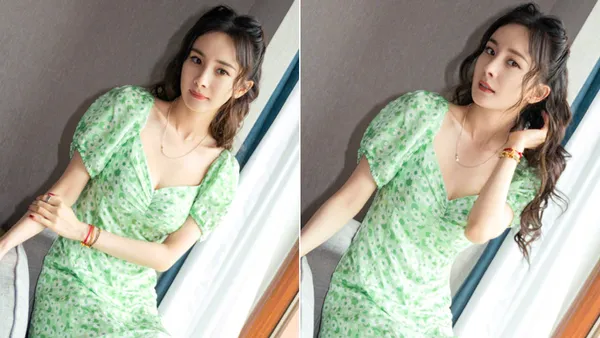 杨幂“八字没一撇演唱会”出发图 穿绿色V领碎花裙秀雪肤