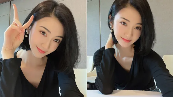 景甜晒短发自拍皮肤白嫩状态佳 穿黑色紧身小V领秀天鹅颈