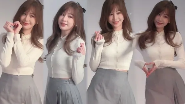 Wang Xinling wears a short skirt to a mirror and a girl with a bow is full of energy.