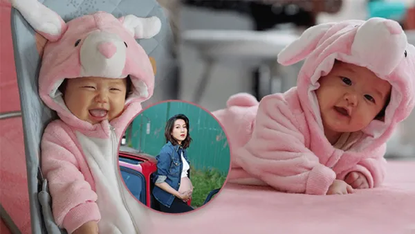 钟嘉欣晒三胎女儿正面照 萌娃灿笑送新年祝福