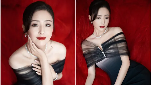 佟丽娅穿露肩裙身姿婀娜 抹红唇笑容迷人