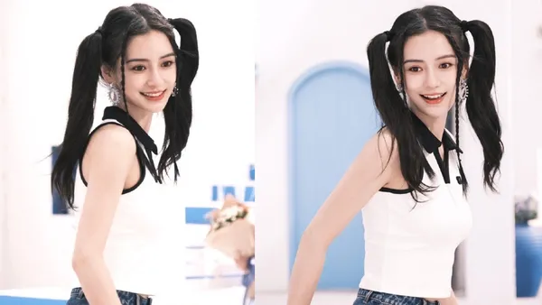 Angelababy双马尾编发造型可爱似少女 穿无袖上衣秀美肤