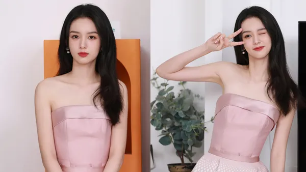 周也粉色抹胸裙造型曝光 对镜头比耶wink青春甜美