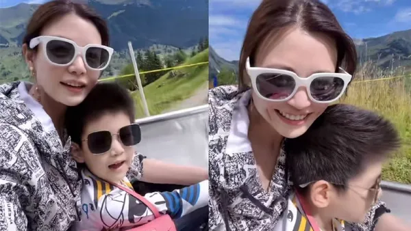 陈妍希带儿子瑞士度假 靠在小星星头顶露出甜美梨涡
