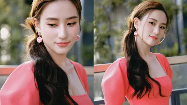 何超莲穿低领裙展露好身材 粉色爱心耳环甜度爆表