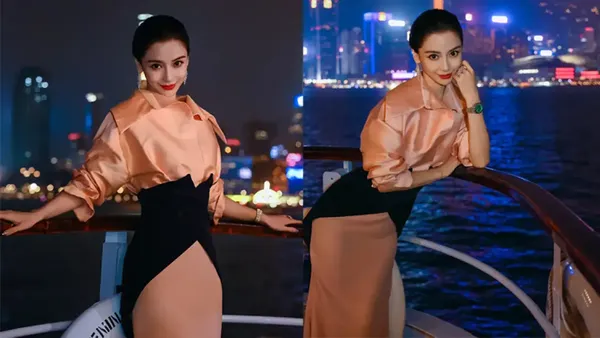 杨颖拍夜色氛围感大片!背后霓虹闪烁画面唯美动人