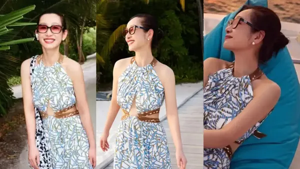 秦海璐晒海边度假美照 一袭蓝裙悠闲自在