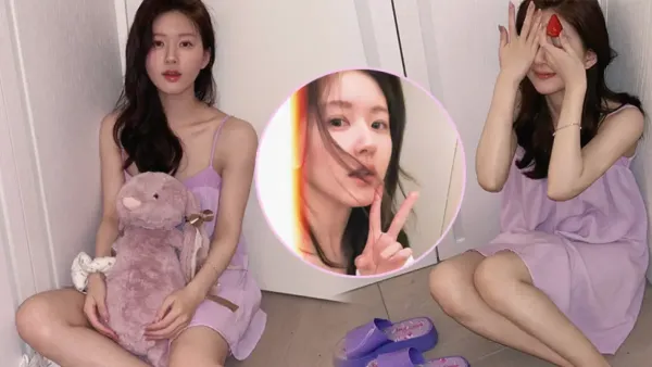 Zhao Lusi wears a purple nightdress and takes photos in the room. She has a slim figure and a girly feeling.