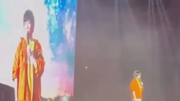 Mayday concert responds to lip-synching controversy, saying standing here is the best proof