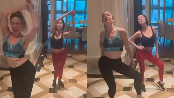 Xiao S dances Zumba at home and easily twists his hips, wears a waist vest, red tights, and has a hot figure.