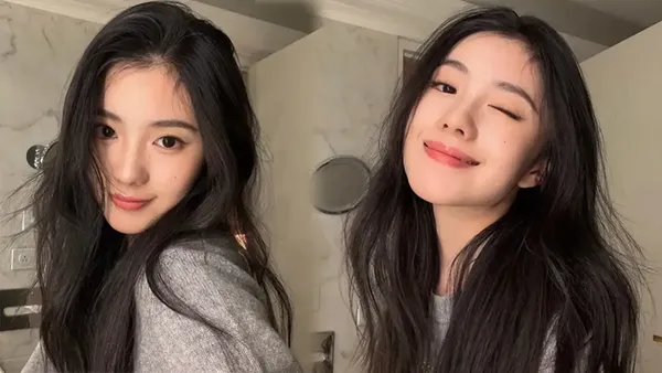 Liu Haocun wears a gray sweater, his eyes are gentle and his long hair draped over his shoulders and feels full of atmosphere