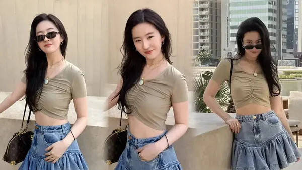 刘亦菲的“松弛感画报”:卡其短T+牛仔裙,把城市街角穿成随性日常