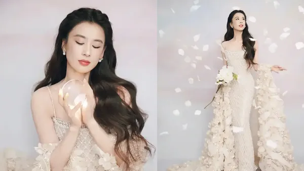 黄圣依裹着玫瑰雾赴约 白裙是今晚的浪漫注脚