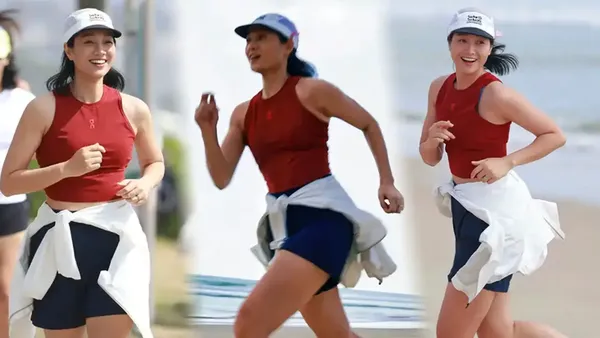 朱丹红背心搭短裤秀健美身姿 海边肆意奔跑活力拉满